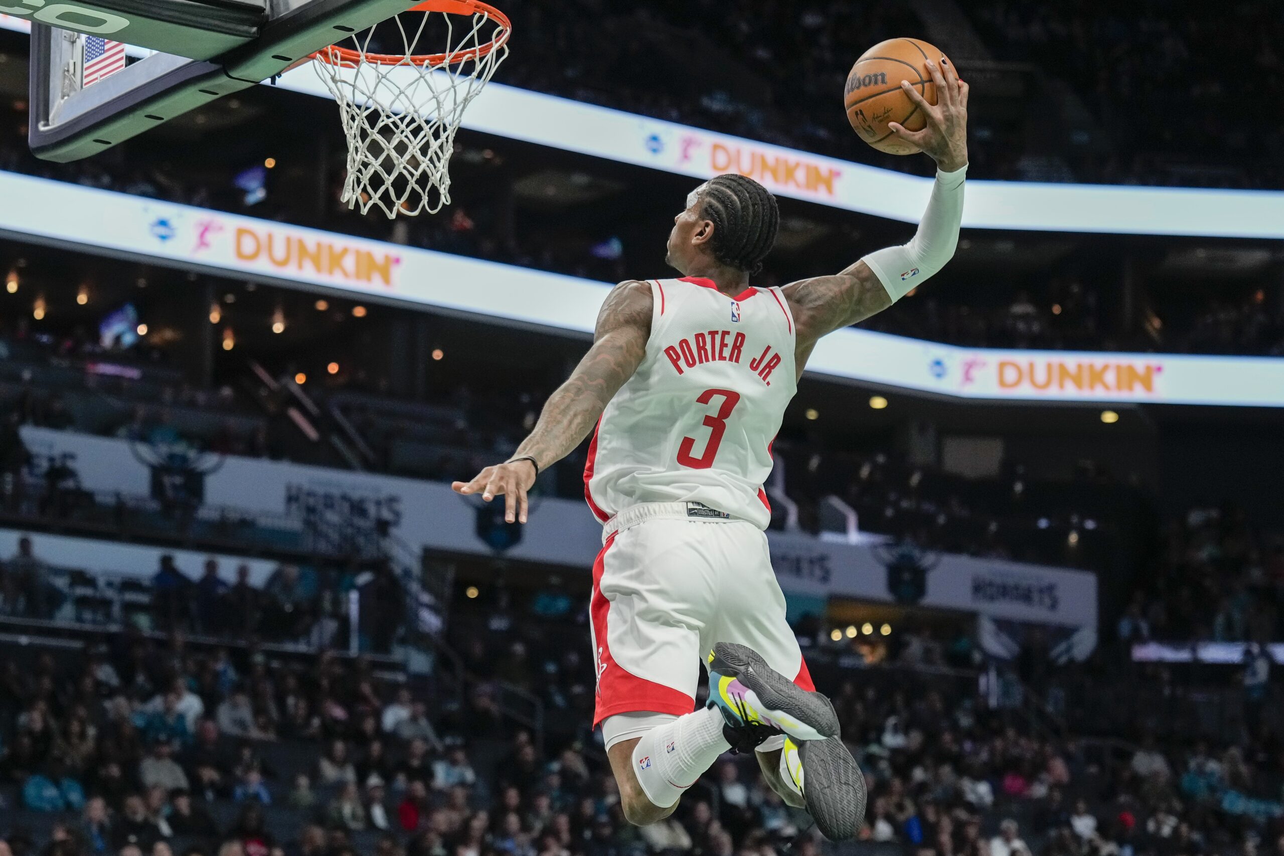 Apr 7, 2023; Charlotte, North Carolina, USA; Houston Rockets guard Kevin Porter Jr. (3) dunks the ball against the Charlotte Hornets during the first quarter at the Spectrum Center. Mandatory Credit: Jim Dedmon-USA TODAY Sports