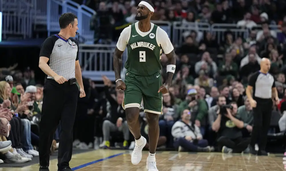 Dec 11, 2023; Milwaukee, Wisconsin, USA; Milwaukee Bucks forward Bobby Portis (9) reacts after scoring a basket during the second quarter against the Chicago Bulls at Fiserv Forum. Mandatory Credit: Jeff Hanisch-USA TODAY Sports