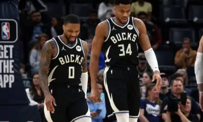Feb 15, 2024; Memphis, Tennessee, USA; Milwaukee Bucks guard Damian Lillard (0) and forward Giannis Antetokounmpo (34) look on during the first half against the Memphis Grizzlies at FedExForum. Mandatory Credit: Petre Thomas-USA TODAY Sports