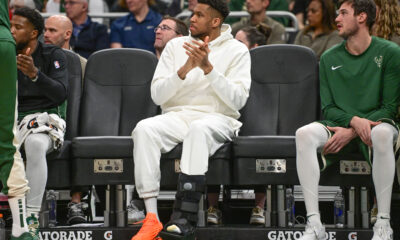 Apr 10, 2024; Milwaukee, Wisconsin, USA; Milwaukee Bucks forward Giannis Antetokounmpo (34) sits on the bench with a calf injury in the second quarter against the Orlando Magic at Fiserv Forum. Mandatory Credit: Benny Sieu-USA TODAY Sports
