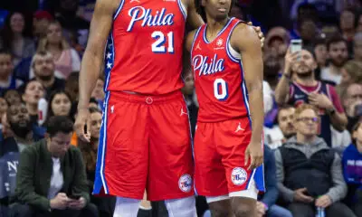 Apr 12, 2024; Philadelphia, Pennsylvania, USA; Philadelphia 76ers center Joel Embiid (21) and guard Tyrese Maxey (0) stand together during a break in action in the fourth quarter against the Orlando Magic at Wells Fargo Center. Mandatory Credit: Bill Streicher-USA TODAY Sports
