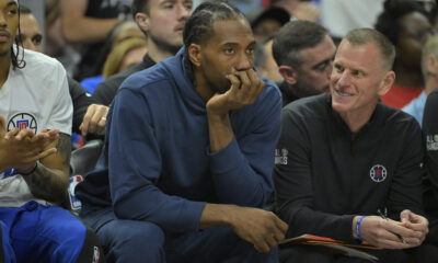 Apr 21, 2024; Los Angeles, California, USA; Los Angeles Clippers forward Kawhi Leonard (2) looks on from the bench during game one of the first round for the 2024 NBA playoffs against the Dallas Mavericks at Crypto.com Arena. Mandatory Credit: Jayne Kamin-Oncea-USA TODAY Sports