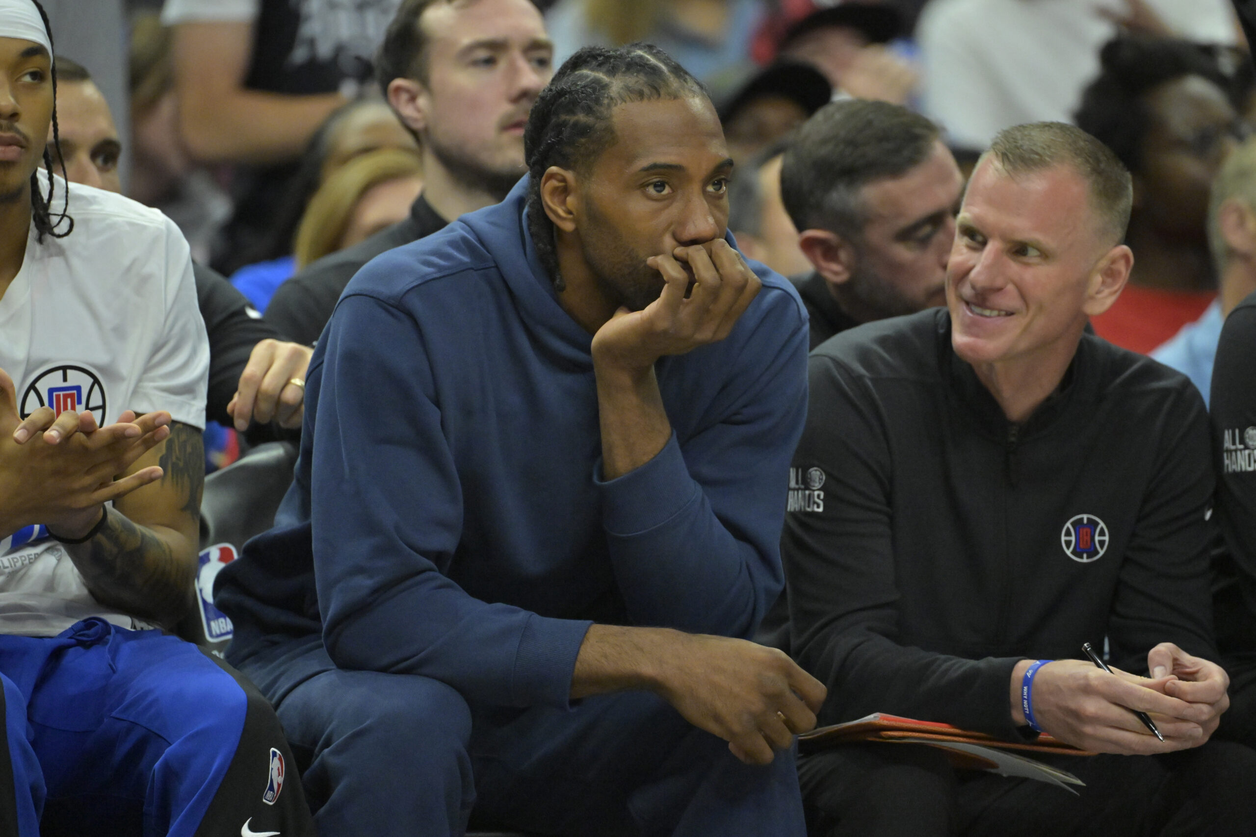 Apr 21, 2024; Los Angeles, California, USA; Los Angeles Clippers forward Kawhi Leonard (2) looks on from the bench during game one of the first round for the 2024 NBA playoffs against the Dallas Mavericks at Crypto.com Arena. Mandatory Credit: Jayne Kamin-Oncea-USA TODAY Sports