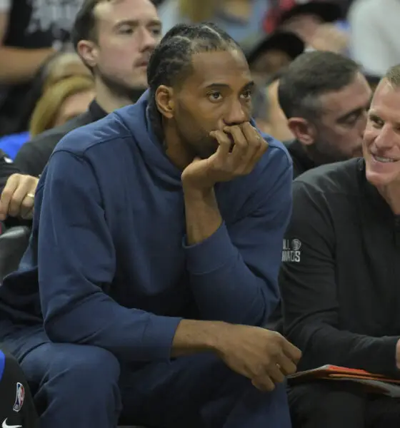 Apr 21, 2024; Los Angeles, California, USA; Los Angeles Clippers forward Kawhi Leonard (2) looks on from the bench during game one of the first round for the 2024 NBA playoffs against the Dallas Mavericks at Crypto.com Arena. Mandatory Credit: Jayne Kamin-Oncea-USA TODAY Sports