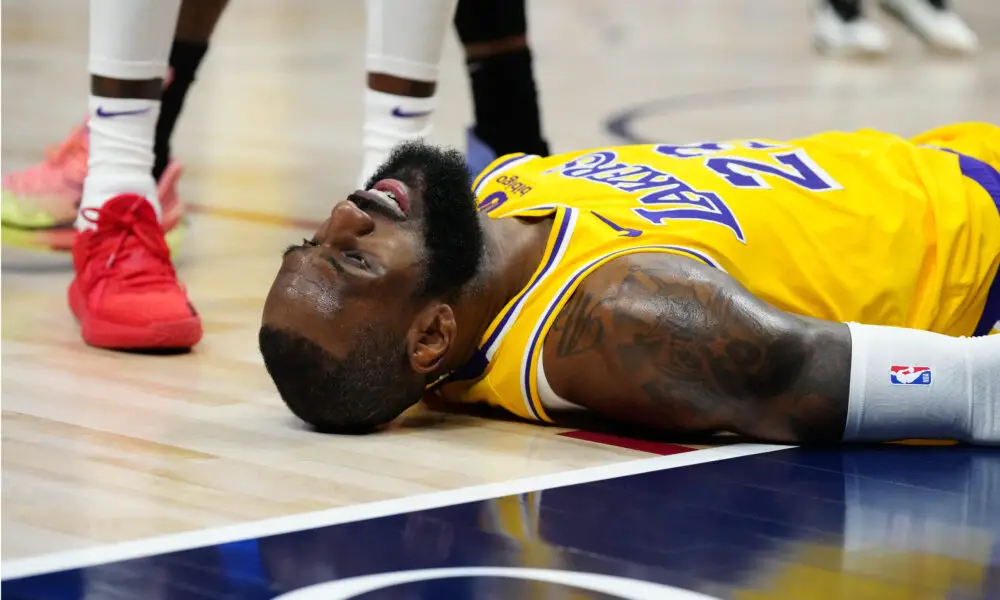 Apr 22, 2024; Denver, Colorado, USA; Los Angeles Lakers forward LeBron James (23) lays on the court in the second quarter against the Denver Nuggets during game two of the first half during the 2024 NBA playoffs at Ball Arena. Mandatory Credit: Ron Chenoy-USA TODAY Sports