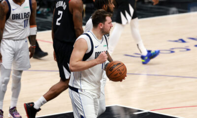 Apr 23, 2024; Los Angeles, California, USA; Dallas Mavericks guard Luka Doncic (77) reacts after defeating the Los Angeles Clippers in game two of the first round for the 2024 NBA playoffs at Crypto.com Arena. Mandatory Credit: Kiyoshi Mio-USA TODAY Sports