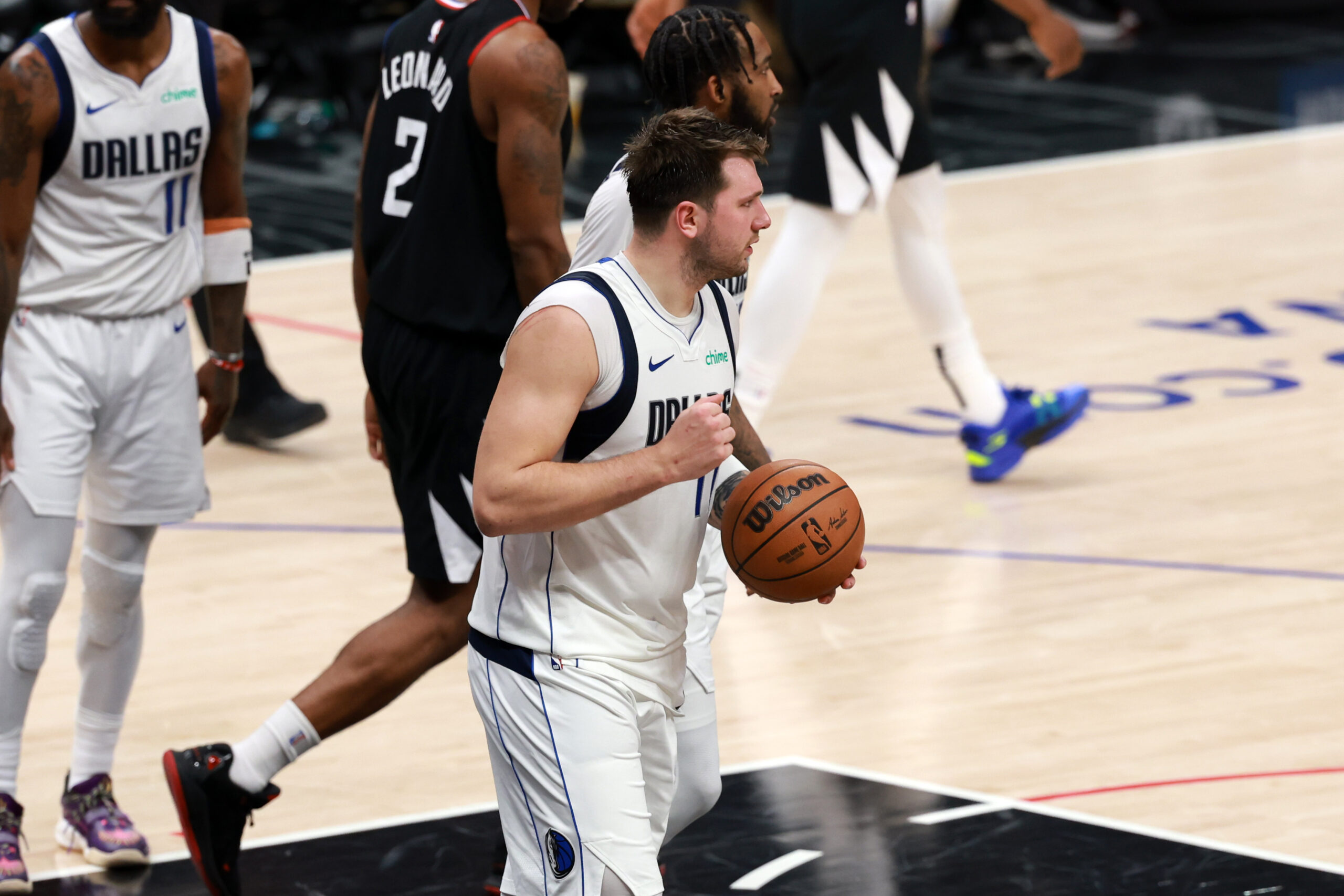 Apr 23, 2024; Los Angeles, California, USA; Dallas Mavericks guard Luka Doncic (77) reacts after defeating the Los Angeles Clippers in game two of the first round for the 2024 NBA playoffs at Crypto.com Arena. Mandatory Credit: Kiyoshi Mio-USA TODAY Sports