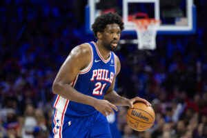 Apr 25, 2024; Philadelphia, Pennsylvania, USA; Philadelphia 76ers center Joel Embiid (21) dribbles against the New York Knicks during the second half of game three of the first round for the 2024 NBA playoffs at Wells Fargo Center. Mandatory Credit: Bill Streicher-USA TODAY Sports