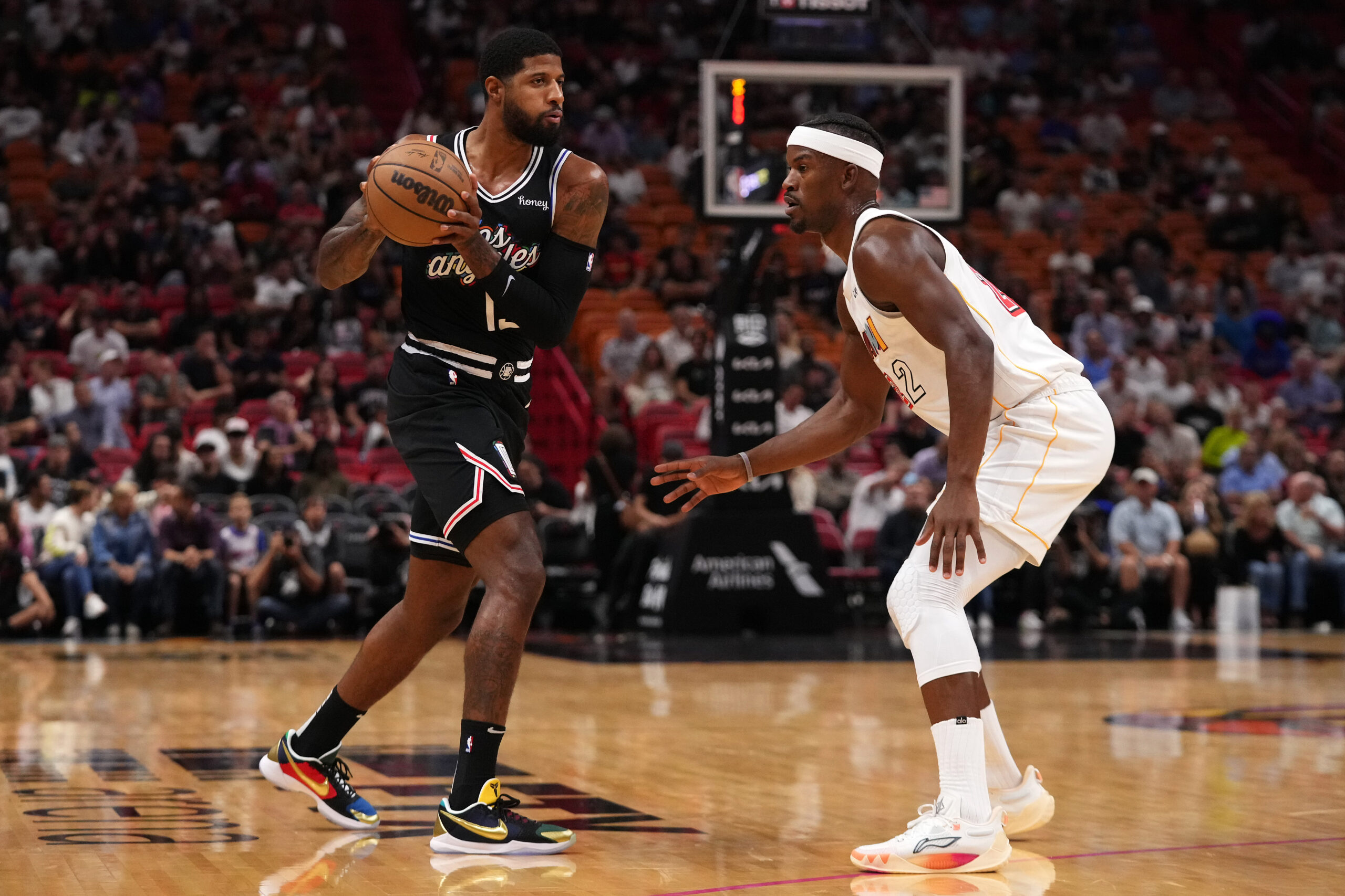 Dec 8, 2022; Miami, Florida, USA; LA Clippers guard Paul George (13). controls the ball against Miami Heat forward Jimmy Butler (22) during the first half at FTX Arena. Mandatory Credit: Jasen Vinlove-USA TODAY Sports