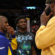Oct 13, 2023; Los Angeles, California, USA; Golden State Warriors guard Chris Paul (3, left) talks with Los Angeles Lakers forward LeBron James (23, right) as LeBron's son Bronny (center) looks on after an NBA preseason basketball game at Crypto.com Arena. Mandatory Credit: Kiyoshi Mio-USA TODAY Sports