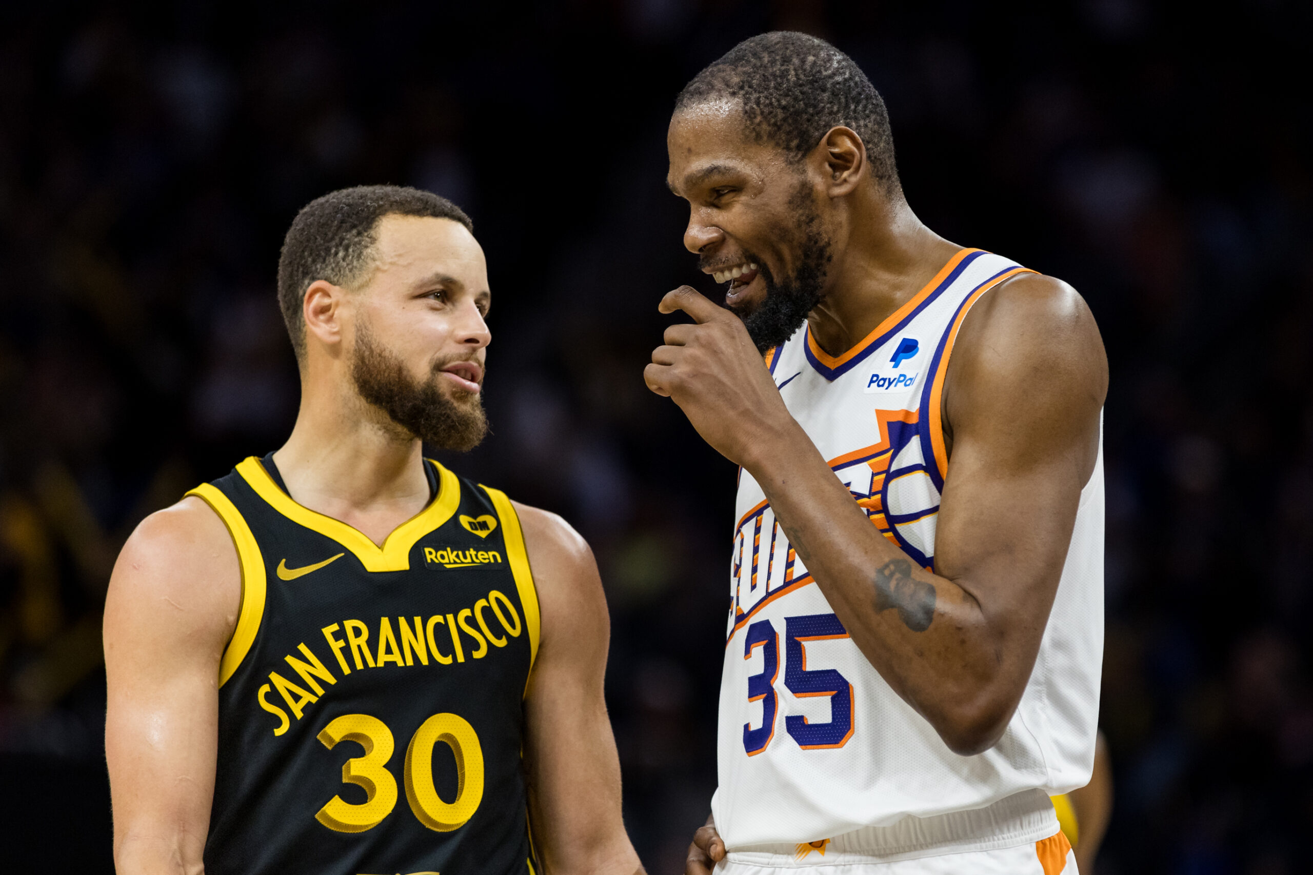 Feb 10, 2024; San Francisco, California, USA; Golden State Warriors guard Stephen Curry (30) and Phoenix Suns forward Kevin Durant (35) talk during the second half at Chase Center. Mandatory Credit: John Hefti-USA TODAY Sports
