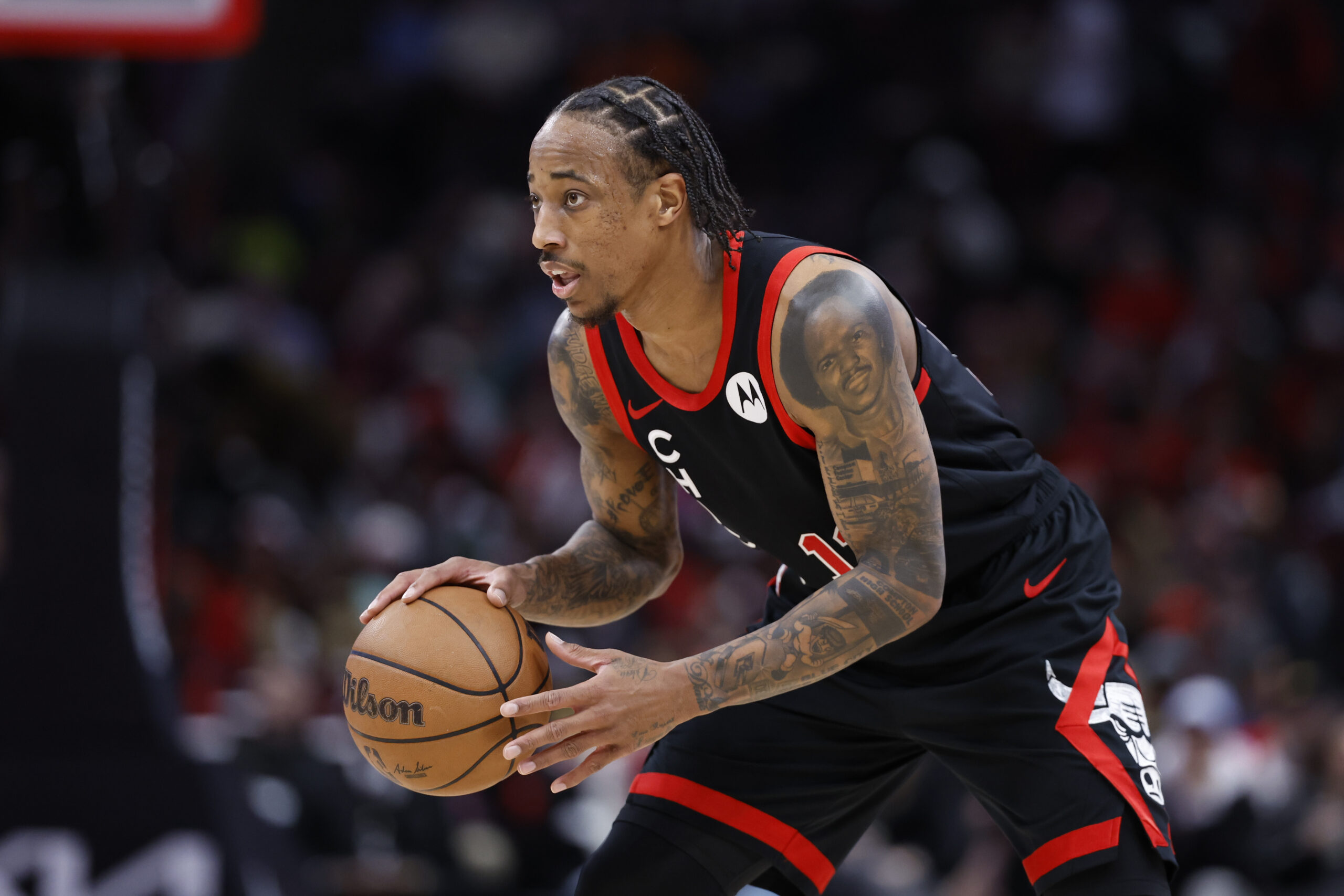 Apr 1, 2024; Chicago, Illinois, USA; Chicago Bulls forward DeMar DeRozan (11) looks to pass the ball against the Atlanta Hawks during the first half at United Center. Mandatory Credit: Kamil Krzaczynski-USA TODAY Sports