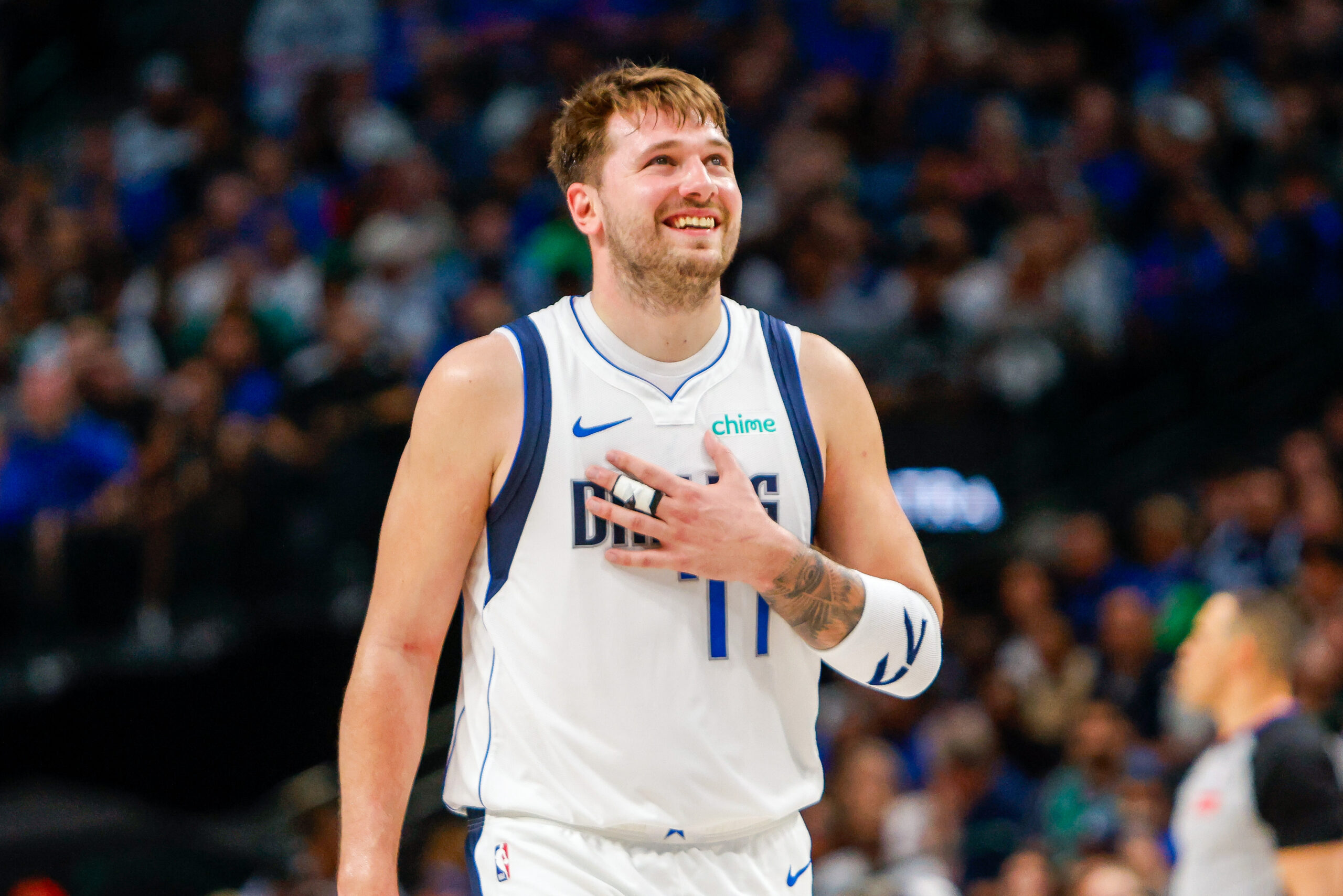 Apr 7, 2024; Dallas, Texas, USA; Dallas Mavericks guard Luka Doncic (77) smiles during the fourth quarter against the Houston Rockets at American Airlines Center. Mandatory Credit: Andrew Dieb-USA TODAY Sports