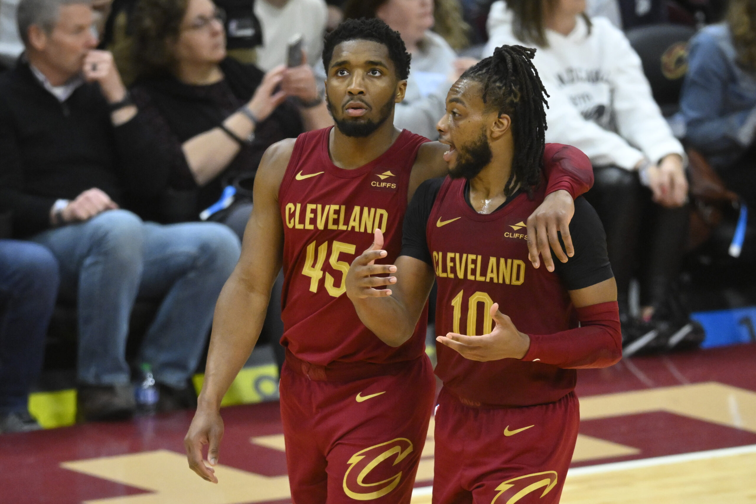 Apr 12, 2024; Cleveland, Ohio, USA; Cleveland Cavaliers guard Donovan Mitchell (45) and guard Darius Garland (10) talk in the fourth quarter against the Indiana Pacers at Rocket Mortgage FieldHouse. Mandatory Credit: David Richard-USA TODAY Sports