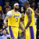 Apr 12, 2024; Memphis, Tennessee, USA; Los Angeles Lakers forward Anthony Davis (3) reacts with forward LeBron James (23) during the second half against the Memphis Grizzlies at FedExForum. Mandatory Credit: Petre Thomas-USA TODAY Sports