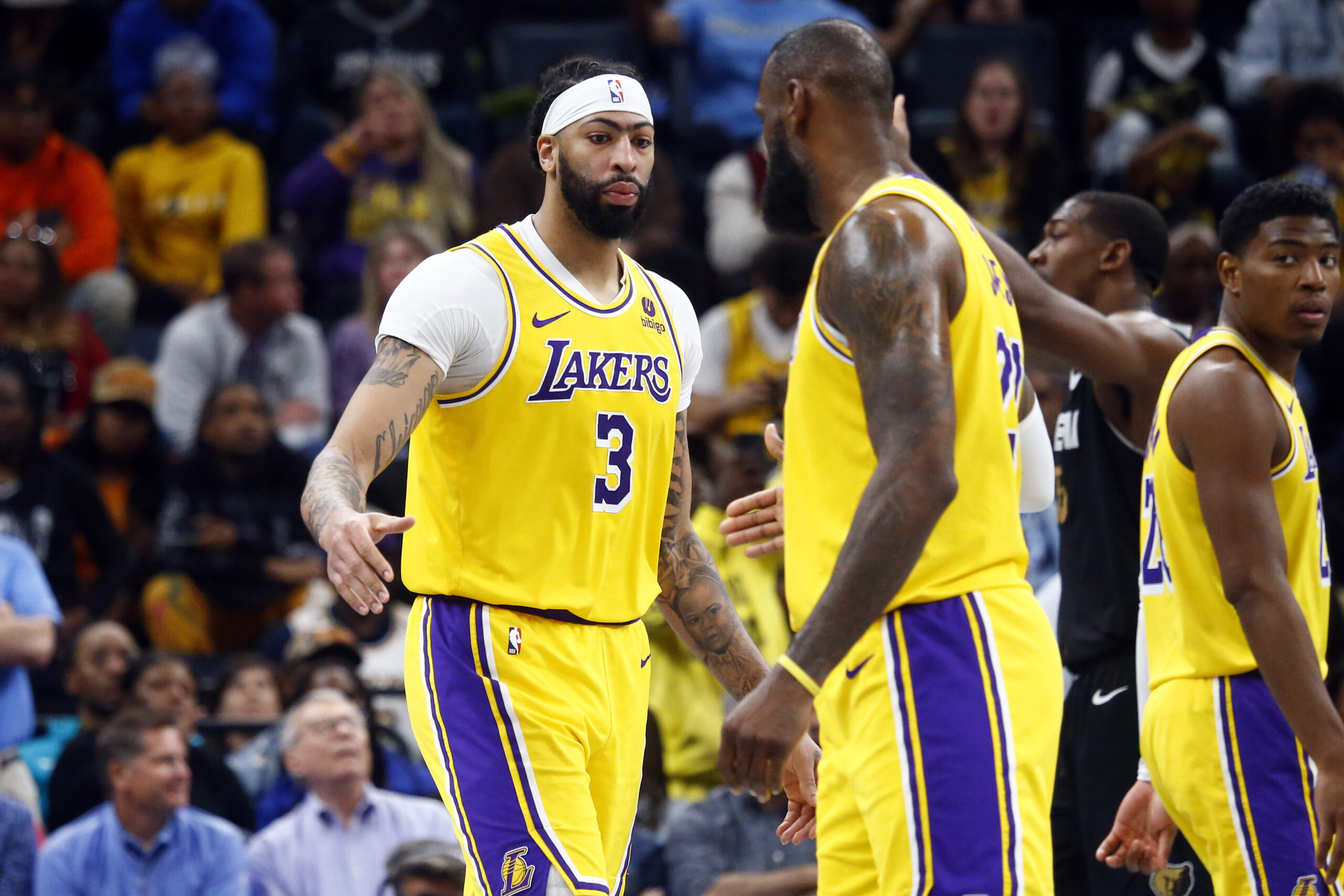 Apr 12, 2024; Memphis, Tennessee, USA; Los Angeles Lakers forward Anthony Davis (3) reacts with forward LeBron James (23) during the second half against the Memphis Grizzlies at FedExForum. Mandatory Credit: Petre Thomas-USA TODAY Sports