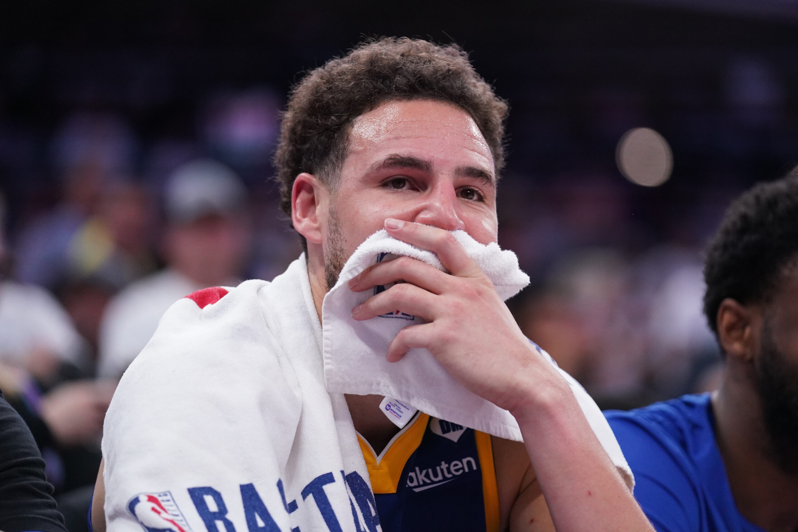 Apr 16, 2024; Sacramento, California, USA; Golden State Warriors guard Klay Thompson (11) sits on the bench during action against the Sacramento Kings in the fourth quarter during a play-in game of the 2024 NBA playoffs at the Golden 1 Center. Mandatory Credit: Cary Edmondson-USA TODAY Sports