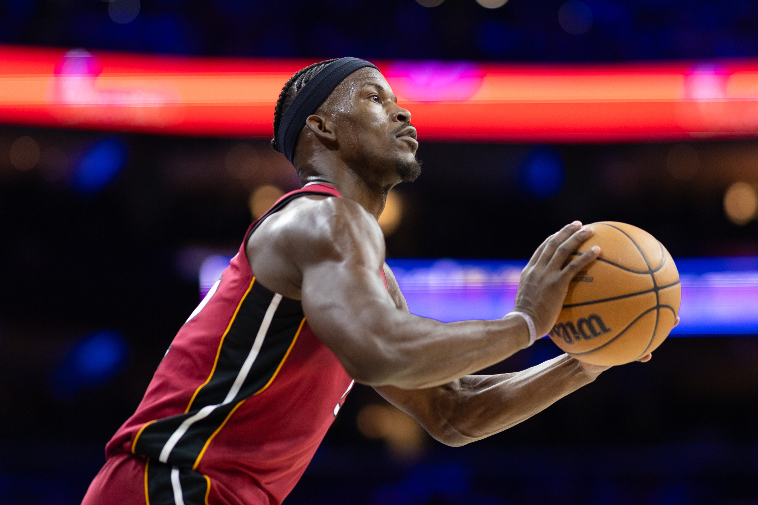Apr 17, 2024; Philadelphia, Pennsylvania, USA; Miami Heat forward Jimmy Butler (22) lines up a shot against the Philadelphia 76ers during the second quarter of a play-in game of the 2024 NBA playoffs at Wells Fargo Center. Mandatory Credit: Bill Streicher-USA TODAY Sports