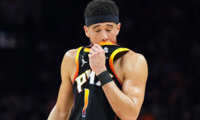 Apr 28, 2024; Phoenix, Arizona, USA; Phoenix Suns guard Devin Booker (1) reacts against the Minnesota Timberwolves during the first half of game four of the first round for the 2024 NBA playoffs at Footprint Center. Mandatory Credit: Joe Camporeale-USA TODAY Sports