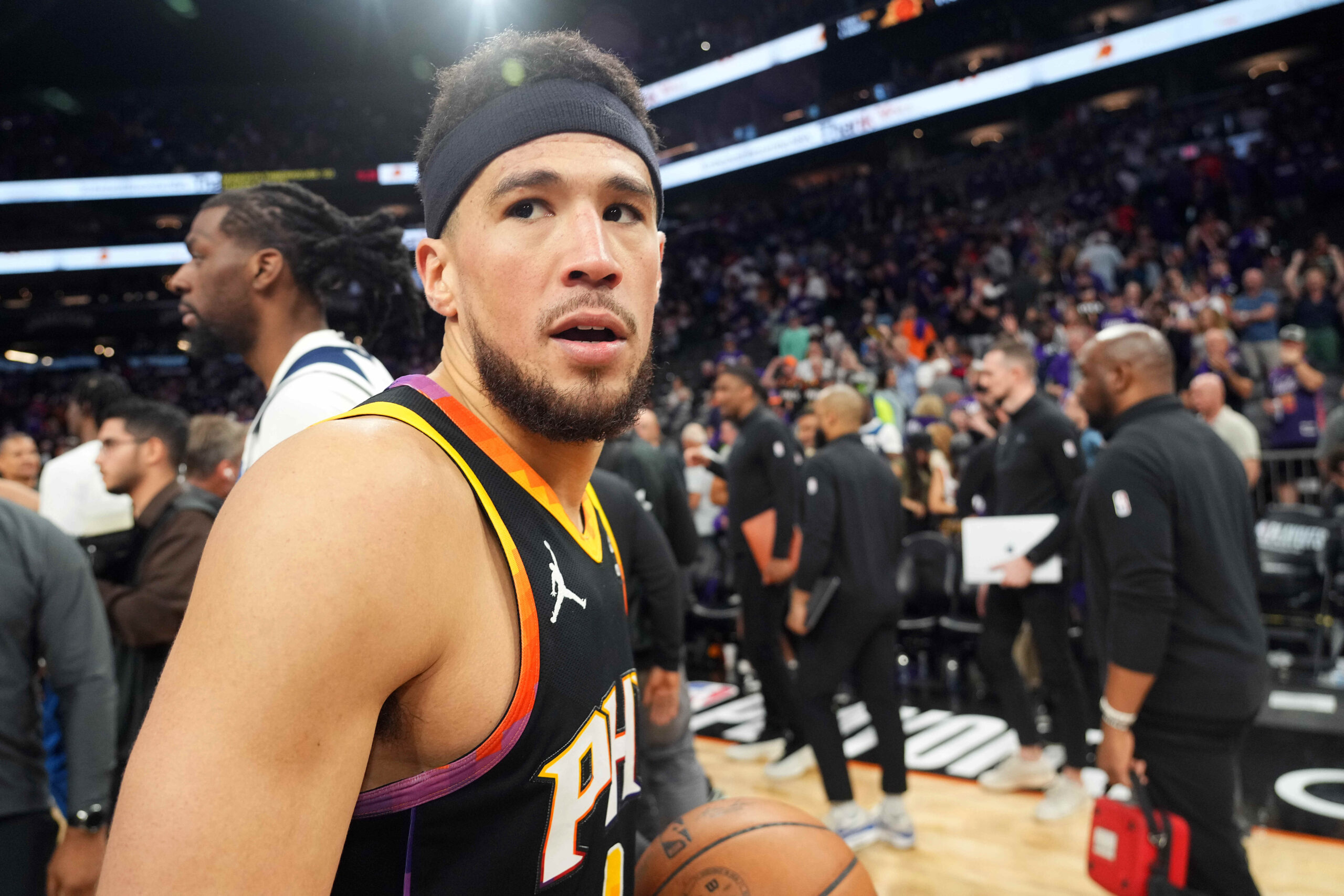 Apr 28, 2024; Phoenix, Arizona, USA; Phoenix Suns guard Devin Booker (1) leaves the court after game four of the first round for the 2024 NBA playoffs against the Minnesota Timberwolves at Footprint Center. Mandatory Credit: Joe Camporeale-USA TODAY Sports