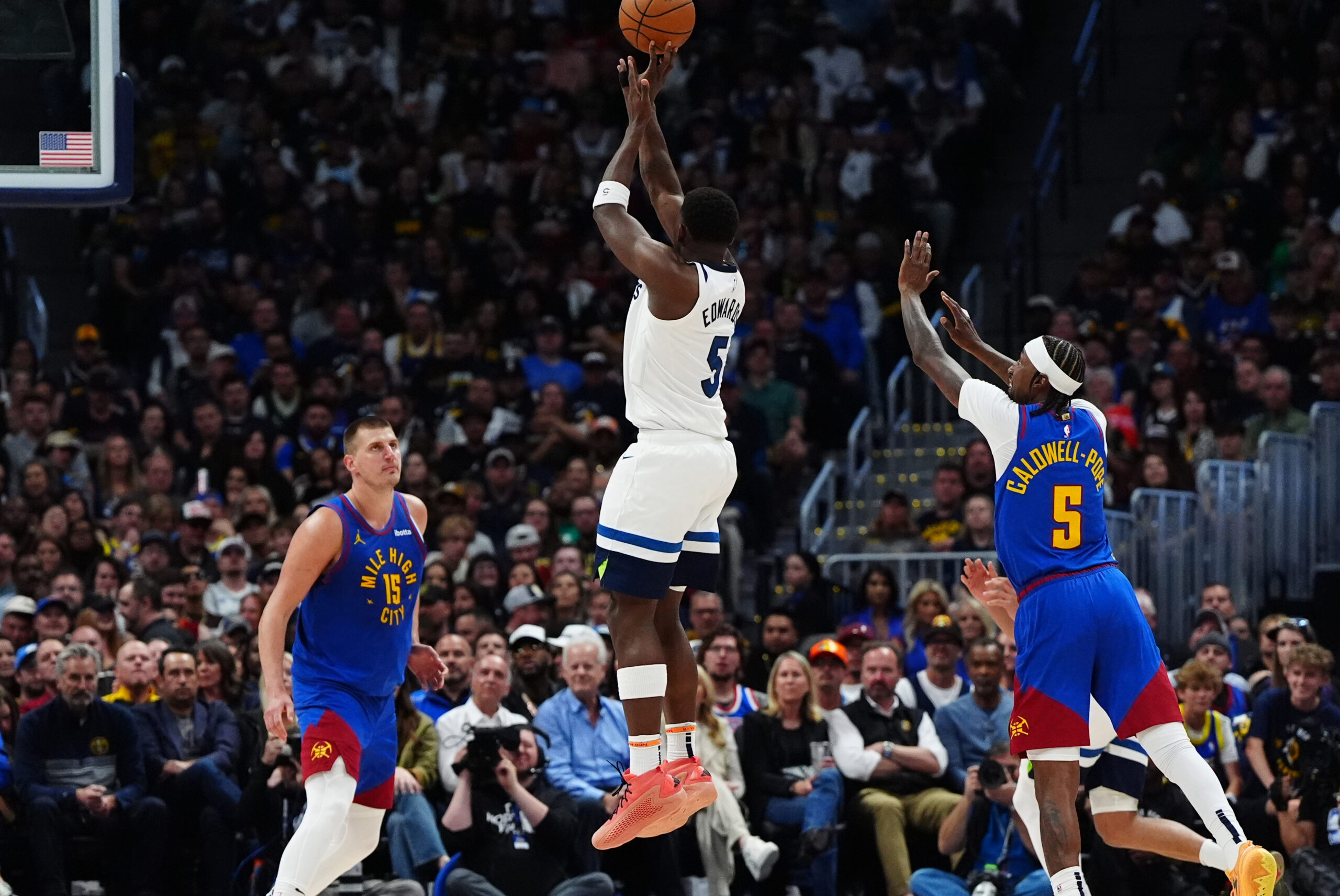 May 4, 2024; Denver, Colorado, USA; Minnesota Timberwolves guard Anthony Edwards (5) shoots the ball in the second half against the Denver Nuggets during game one of the second round for the 2024 NBA playoffs at Ball Arena. Mandatory Credit: Ron Chenoy-USA TODAY Sports