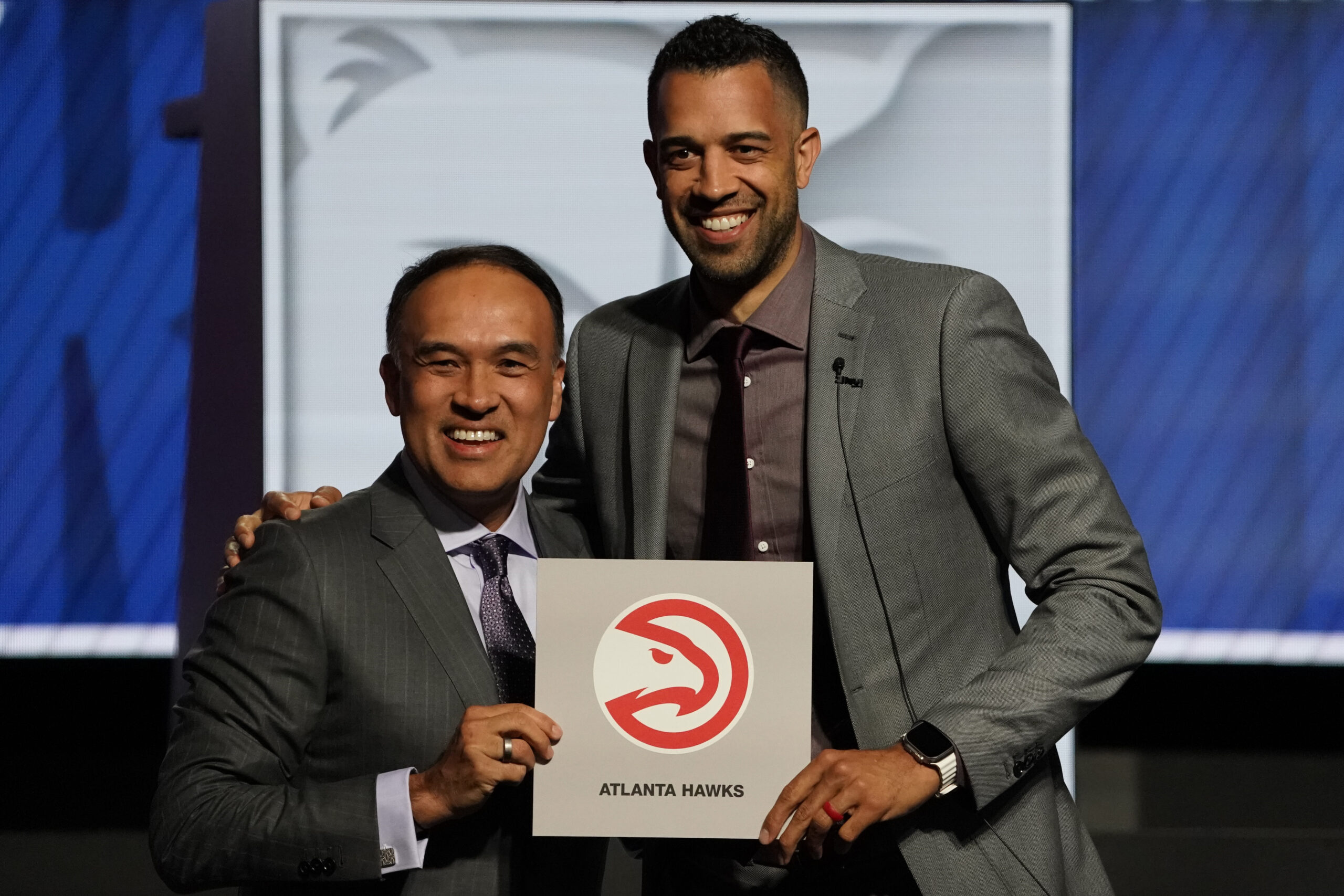 May 12, 2024; Chicago, IL, USA; Atlanta Hawks general manager Landry Fields (right) and Mark Tatum Deputy commissioner of the NBA after the Hawks get the number one pick in the 2024 NBA Draft Lottery at McCormick Place West. Mandatory Credit: David Banks-USA TODAY Sports