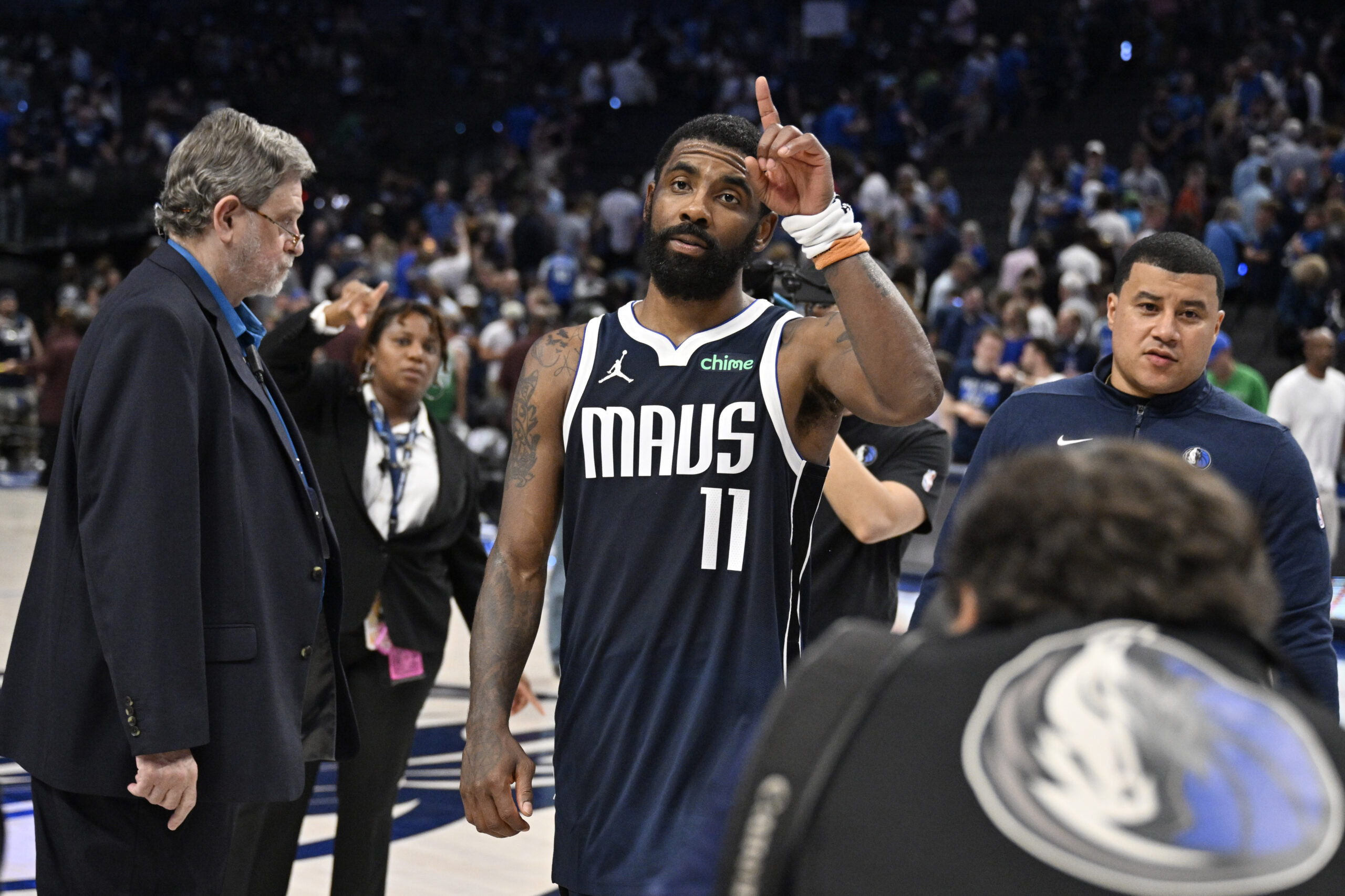 May 26, 2024; Dallas, Texas, USA; Dallas Mavericks guard Kyrie Irving (11) celebrates after the win against the Minnesota Timberwolves in game three of the western conference finals for the 2024 NBA playoffs at American Airlines Center. Mandatory Credit: Jerome Miron-USA TODAY Sports