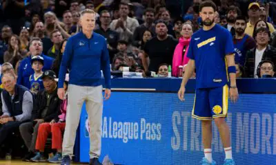 Oct 21, 2022; San Francisco, California, USA; Golden State Warriors head coach Steve Kerr and guard Klay Thompson (11) watch during the second half of the game against the Denver Nuggets at Chase Center. Mandatory Credit: John Hefti-USA TODAY Sports