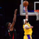 Jan 3, 2024; Los Angeles, California, USA; Los Angeles Lakers forward Anthony Davis (3) defends the basket against Miami Heat center Bam Adebayo (13) during the second half at Crypto.com Arena. Mandatory Credit: Gary A. Vasquez-USA TODAY Sports