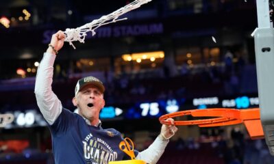 Connecticut Huskies head coach Dan Hurley cuts the basketball net winning the Men's NCAA national championship game against the Purdue Boilermakers at State Farm Stadium in Glendale on April 8, 2024