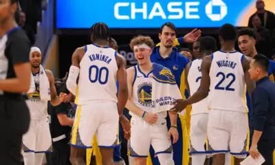 Dec 6, 2023; San Francisco, California, USA; Golden State Warriors guard Brandin Podziemski (2) celebrates with forward Jonathan Kuminga (00) after a time out is called against the Portland Trail Blazers during the fourth quarter at Chase Center. Mandatory Credit: Kelley L Cox-USA TODAY Sports