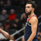 Feb 7, 2024; Washington, District of Columbia, USA; Washington Wizards guard Tyus Jones (5) on the court against the Cleveland Cavaliers during the first half at Capital One Arena. Mandatory Credit: Brad Mills-USA TODAY Sports