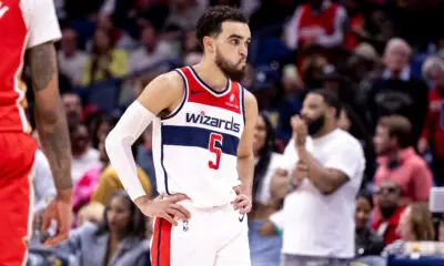 Feb 14, 2024; New Orleans, Louisiana, USA; Washington Wizards guard Tyus Jones (5) looks at the bench during free throw by New Orleans Pelicans guard Trey Murphy III (25) during the second half at Smoothie King Center. Mandatory Credit: Stephen Lew-USA TODAY Sports