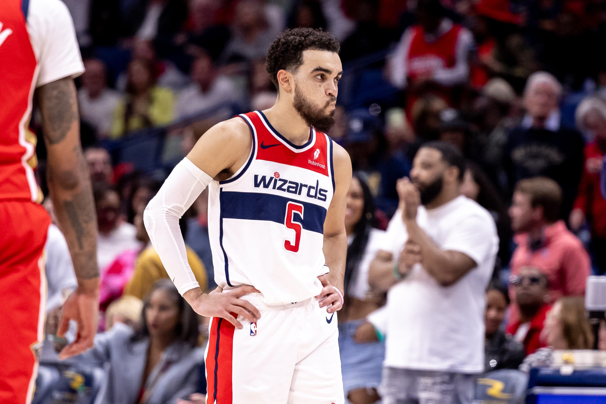 Feb 14, 2024; New Orleans, Louisiana, USA; Washington Wizards guard Tyus Jones (5) looks at the bench during free throw by New Orleans Pelicans guard Trey Murphy III (25) during the second half at Smoothie King Center. Mandatory Credit: Stephen Lew-USA TODAY Sports