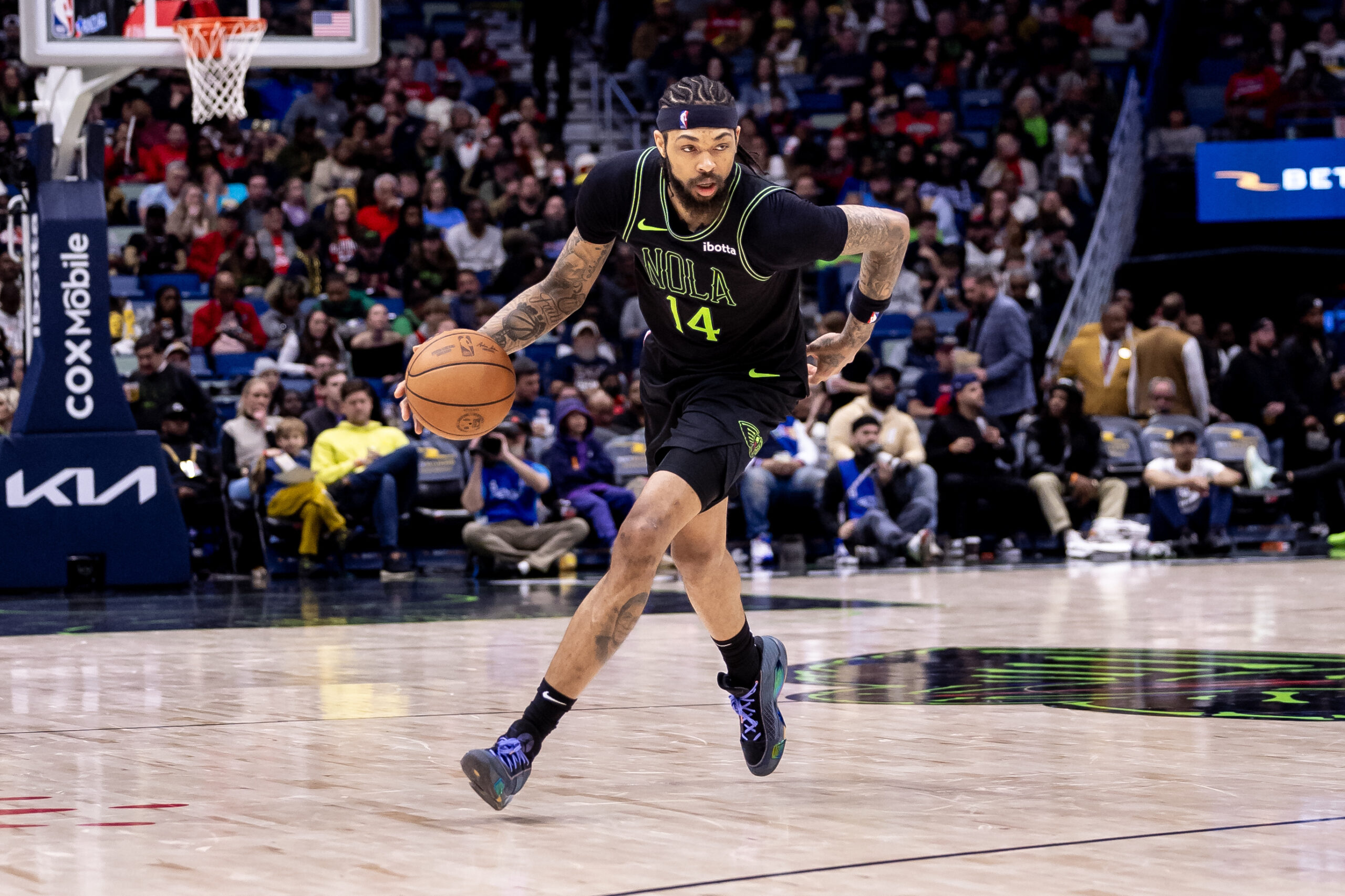 Mar 1, 2024; New Orleans, Louisiana, USA; New Orleans Pelicans forward Brandon Ingram (14) dribbles against the Indiana Pacers during the second half at Smoothie King Center. Mandatory Credit: Stephen Lew-USA TODAY Sports