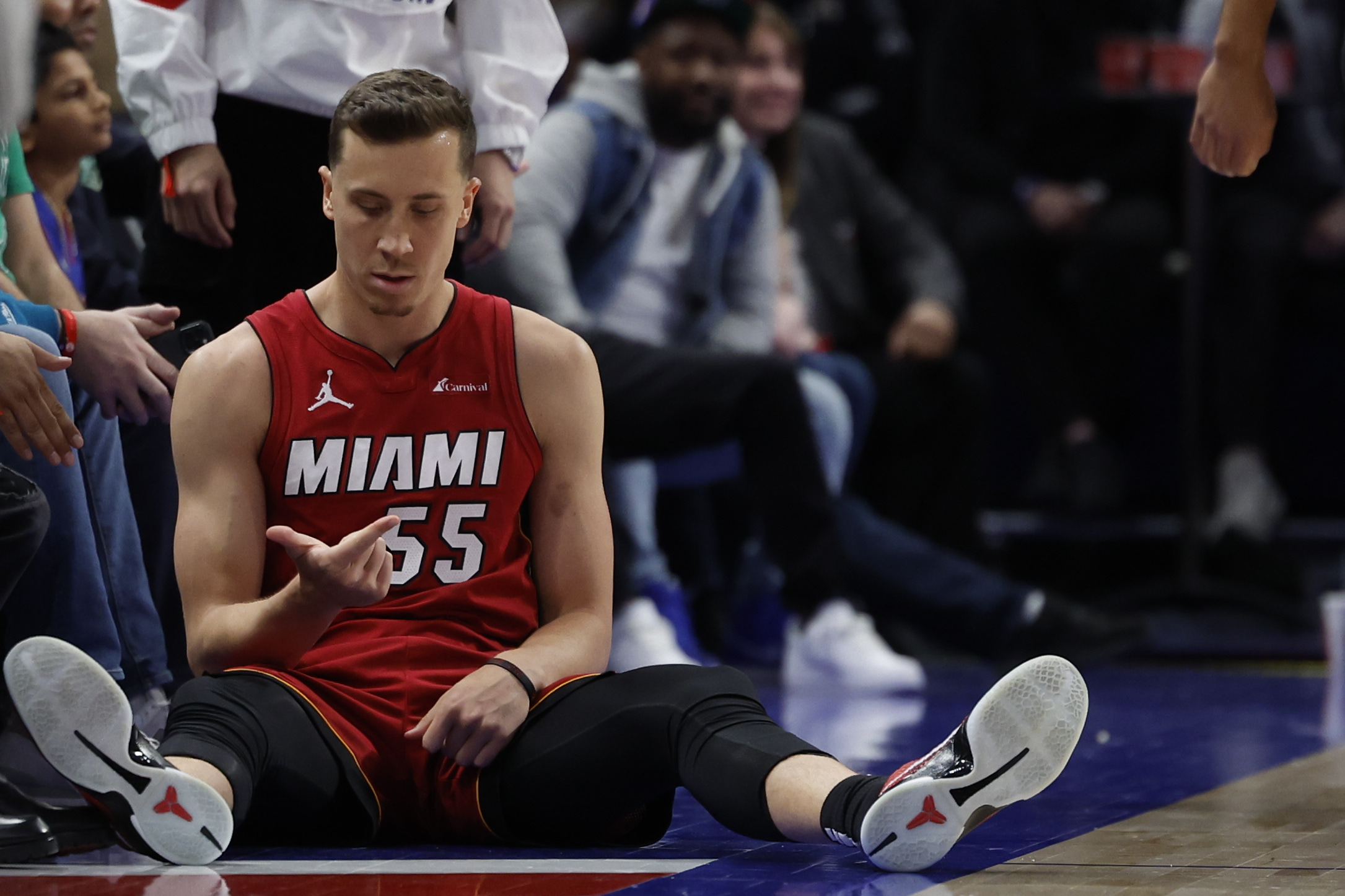 Mar 17, 2024; Detroit, Michigan, USA; Miami Heat forward Duncan Robinson (55) celebrates after he is fouled on a three point basket in the second half against the Detroit Pistons at Little Caesars Arena. Mandatory Credit: Rick Osentoski-USA TODAY Sports