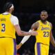 Mar 18, 2024; Los Angeles, California, USA; Los Angeles Lakers forward LeBron James (23) and forward Anthony Davis (3 celebrate against the Atlanta Hawks in the second half at Crypto.com Arena. Mandatory Credit: Kirby Lee-USA TODAY Sports