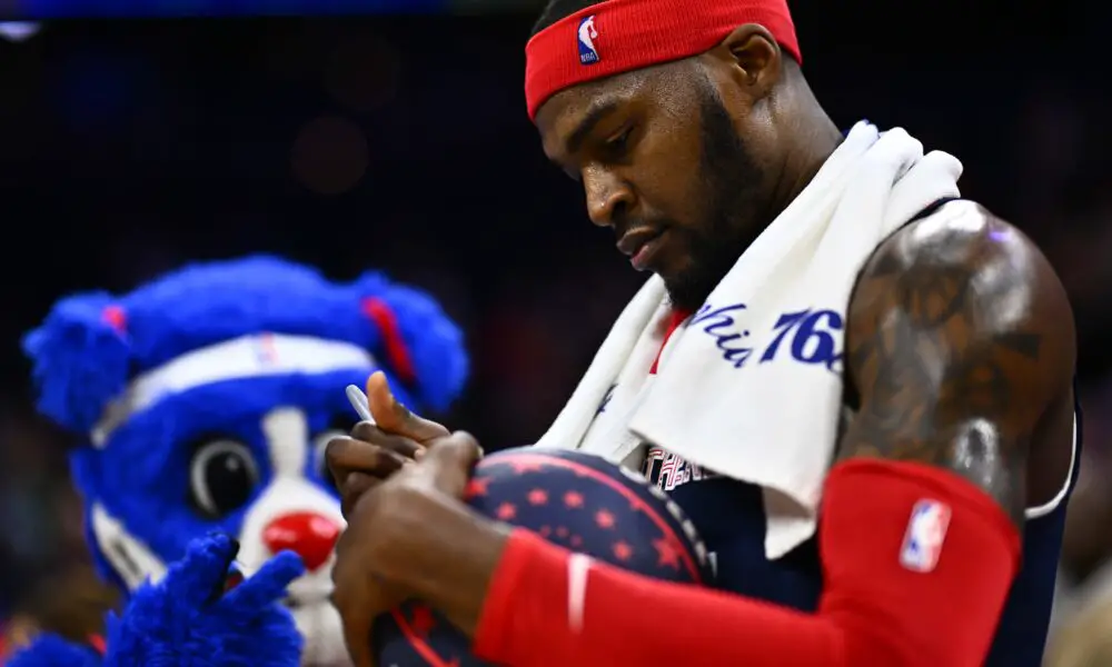 Mar 16, 2024; Philadelphia, Pennsylvania, USA; Philadelphia 76ers forward Paul Reed (44) signs a basketball after the game against the Charlotte Hornets at Wells Fargo Center. Mandatory Credit: Kyle Ross-USA TODAY Sports