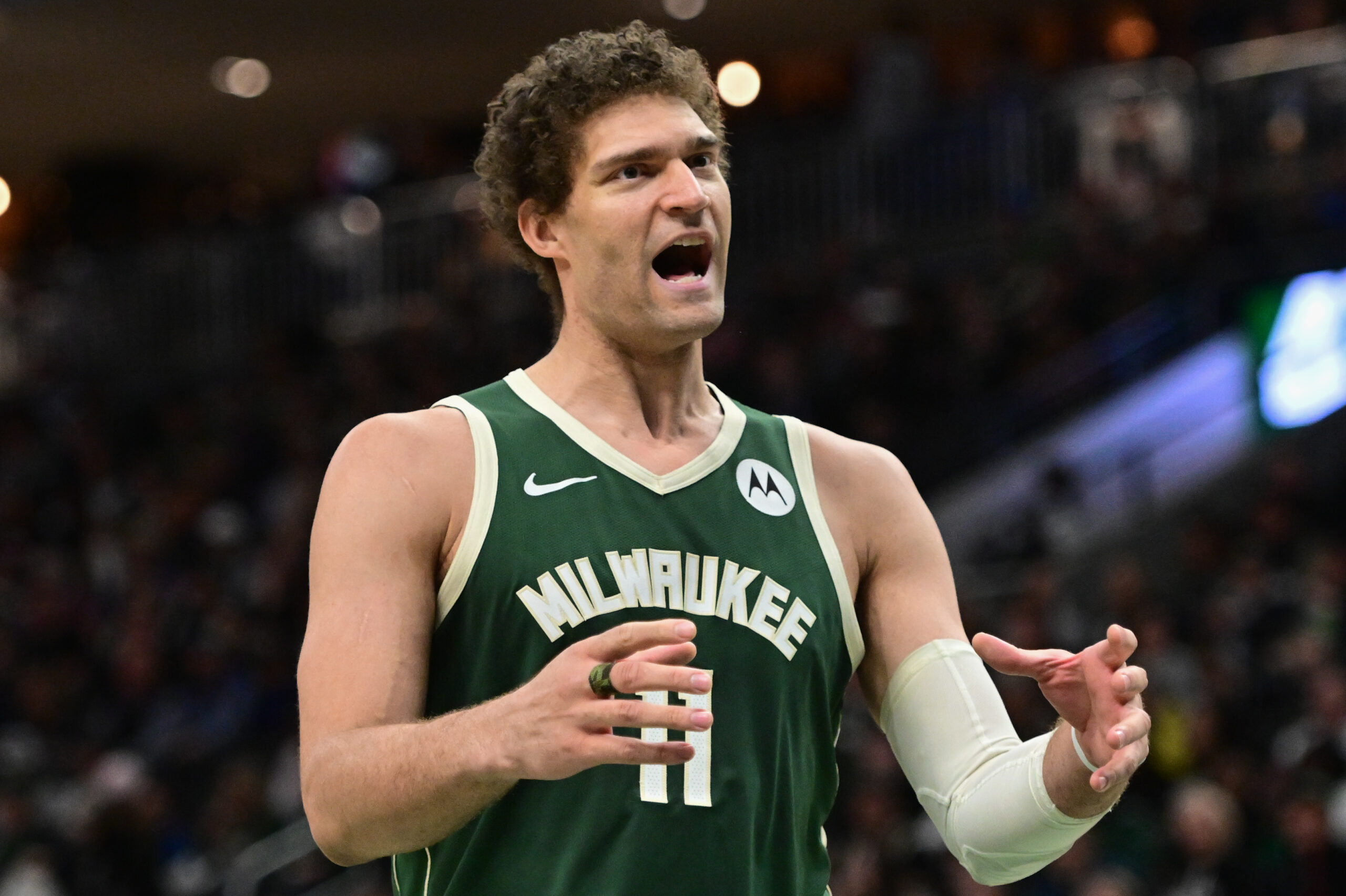 Apr 3, 2024; Milwaukee, Wisconsin, USA; Milwaukee Bucks center Brook Lopez (11) reacts in the second quarter against the Memphis Grizzlies at Fiserv Forum. Mandatory Credit: Benny Sieu-USA TODAY Sports