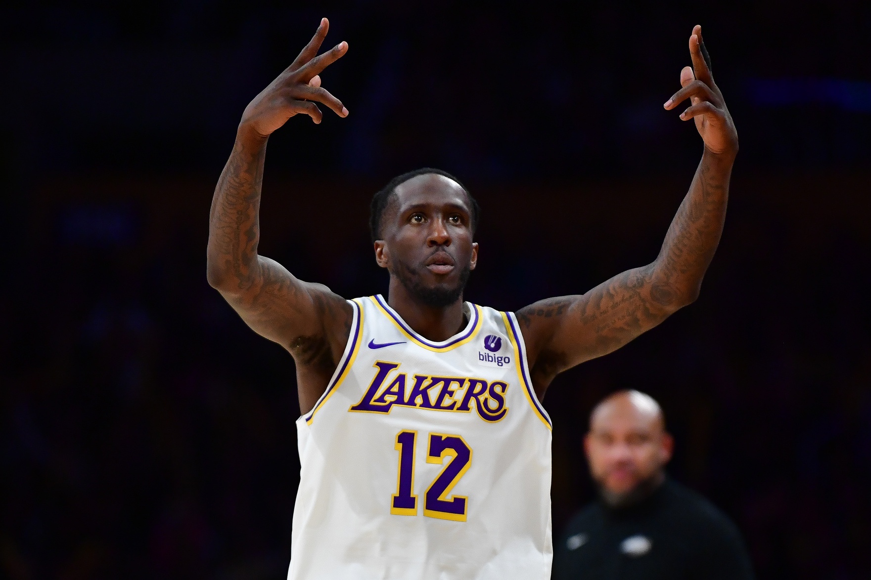 Apr 6, 2024; Los Angeles, California, USA; Los Angeles Lakers forward Taurean Prince (12) reacts after scoring three point basket against the Cleveland Cavaliers during the second half at Crypto.com Arena. Mandatory Credit: Gary A. Vasquez-USA TODAY Sports