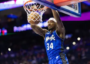 Apr 12, 2024; Philadelphia, Pennsylvania, USA; Orlando Magic center Wendell Carter Jr. (34) dunks the ball against the Philadelphia 76ers during the first quarter at Wells Fargo Center. Mandatory Credit: Bill Streicher-USA TODAY Sports