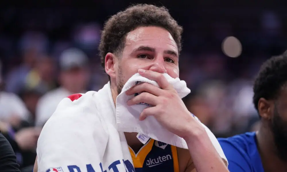 Apr 16, 2024; Sacramento, California, USA; Golden State Warriors guard Klay Thompson (11) sits on the bench during action against the Sacramento Kings in the fourth quarter during a play-in game of the 2024 NBA playoffs at the Golden 1 Center. Mandatory Credit: Cary Edmondson-USA TODAY Sports