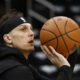 May 1, 2024; Boston, Massachusetts, USA; Miami Heat guard Tyler Herro (14) warms up prior to their game against the Boston Celtics in game five of the first round of the 2024 NBA playoffs at TD Garden. Mandatory Credit: Winslow Townson-USA TODAY Sports