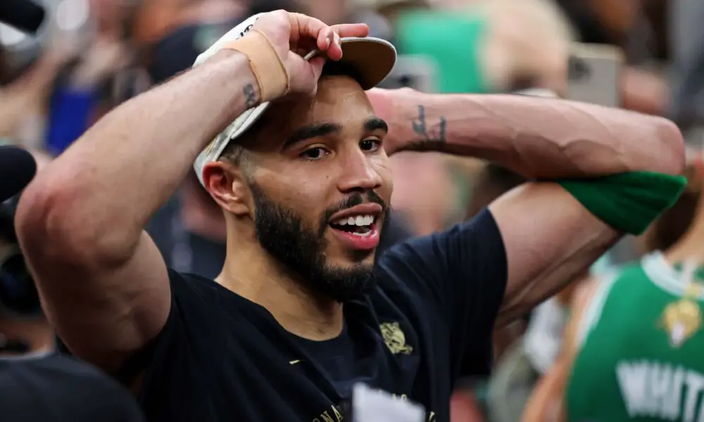 Jun 17, 2024; Boston, Massachusetts, USA; Boston Celtics forward Jayson Tatum (0) celebrates after beating the Dallas Mavericks in game five of the 2024 NBA Finals to win the NBA Championship at TD Garden. Mandatory Credit: Peter Casey-USA TODAY Sports