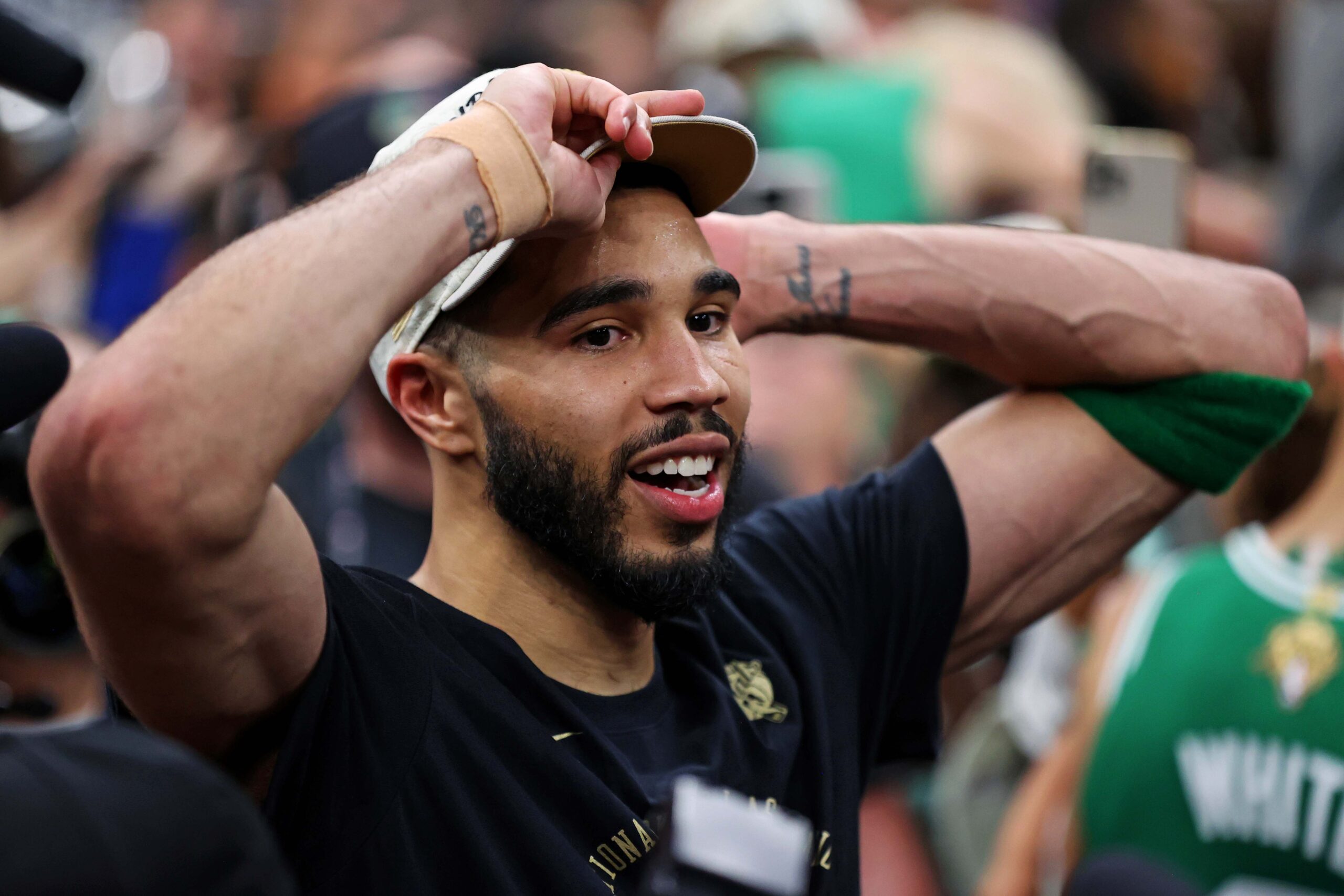 Jun 17, 2024; Boston, Massachusetts, USA; Boston Celtics forward Jayson Tatum (0) celebrates after beating the Dallas Mavericks in game five of the 2024 NBA Finals to win the NBA Championship at TD Garden. Mandatory Credit: Peter Casey-USA TODAY Sports