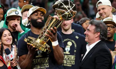 Jun 17, 2024; Boston, Massachusetts, USA; Boston Celtics guard Jaylen Brown (7) celebrates with the Larry O’Brien Trophy after beating the Dallas Mavericks in game five of the 2024 NBA Finals to win the NBA Championship at TD Garden. Mandatory Credit: Peter Casey-USA TODAY Sports