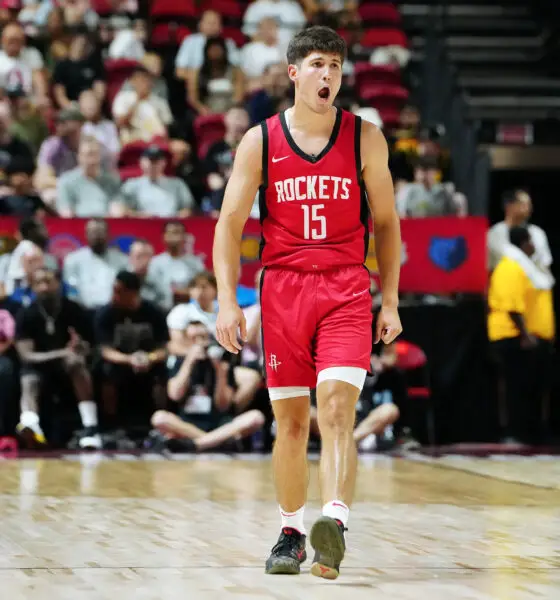 Jul 14, 2024; Las Vegas, NV, USA; Houston Rockets guard Reed Sheppard (15) reacts after scoring against the Washington Wizards during the third quarter at Thomas & Mack Center. Mandatory Credit: Stephen R. Sylvanie-USA TODAY Sports