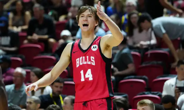 Jul 14, 2024; Las Vegas, NV, USA; Chicago Bulls forward Matas Buzelis (14) shouts at a teammate while playing against the Golden State Warriors during the first quarter at Thomas & Mack Center. Mandatory Credit: Stephen R. Sylvanie-USA TODAY Sports