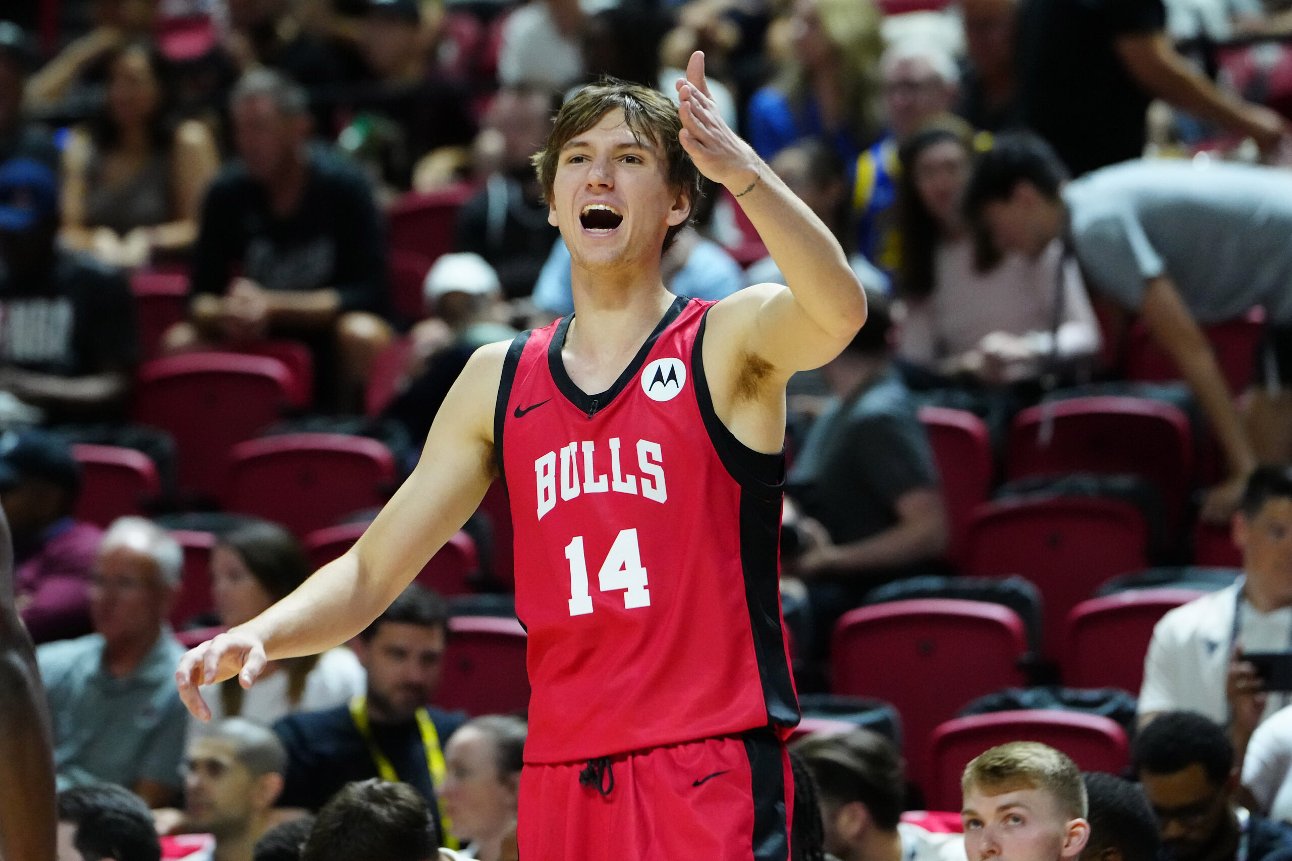 Jul 14, 2024; Las Vegas, NV, USA; Chicago Bulls forward Matas Buzelis (14) shouts at a teammate while playing against the Golden State Warriors during the first quarter at Thomas & Mack Center. Mandatory Credit: Stephen R. Sylvanie-USA TODAY Sports