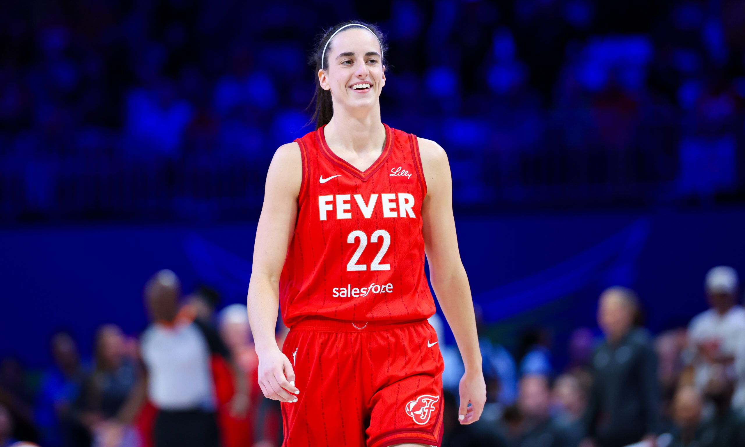 Jul 17, 2024; Arlington, Texas, USA; Indiana Fever guard Caitlin Clark (22) reacts during the first half against the Dallas Wings at College Park Center. Mandatory Credit: Kevin Jairaj-USA TODAY Sports